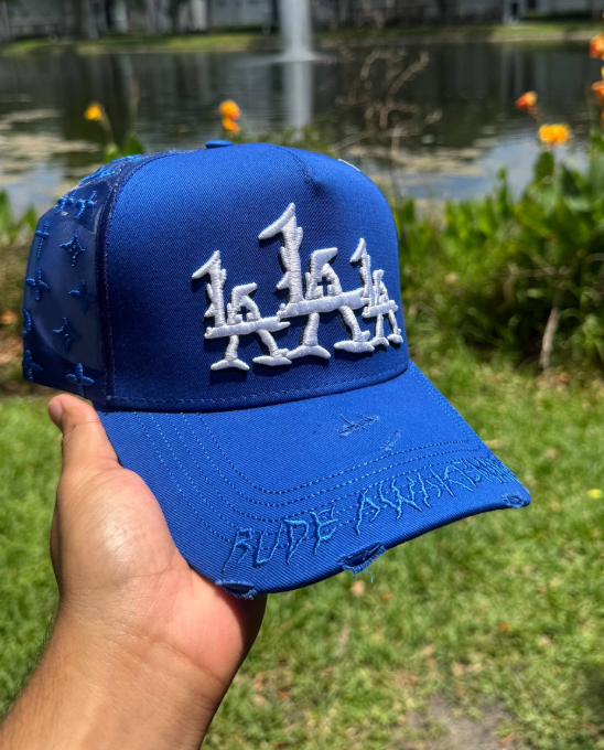 Rude Awakenings LA Repeat Logo Trucker Cap Royal Blue Distressed Monogram Edition